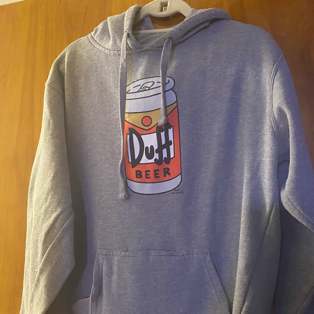 The Simpsons Duff Beer Hoodie with can holder and opener attached